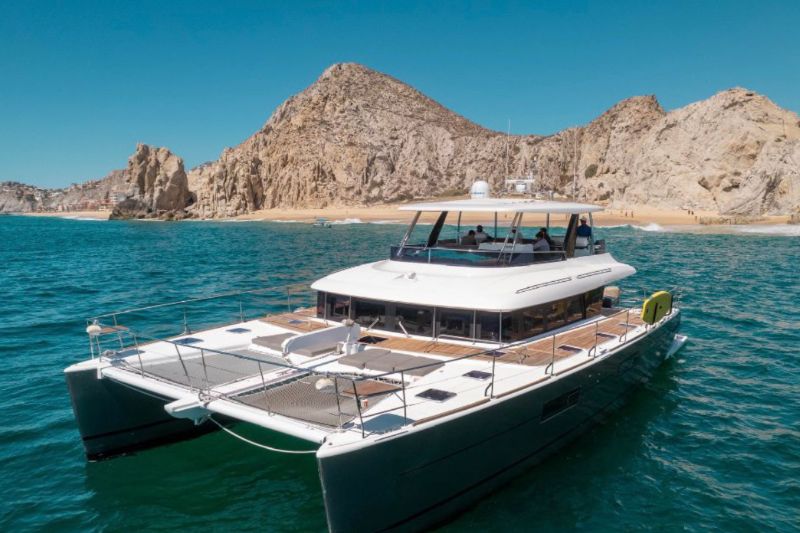 63-foot Lagoon luxury catamaran cruising off the beaches near Land's End